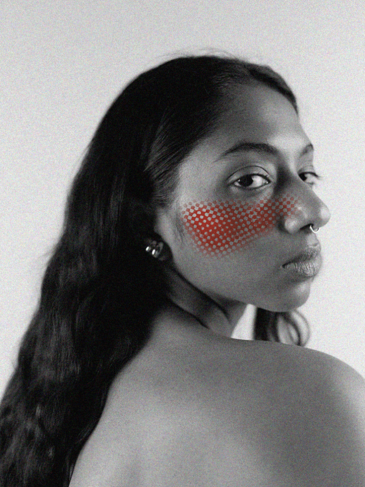 An illustration of a woman with rosacea on her cheek